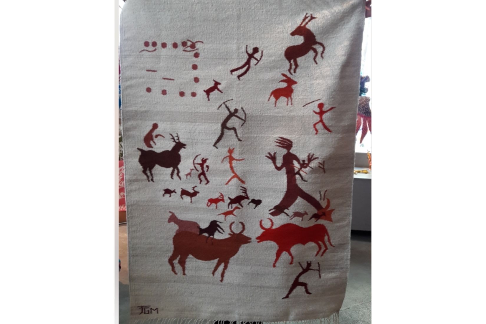 Textil de lana inspirado en pinturas rupestres. Artesano desconocido. Teotitlán del Valle, Oax. (Foto: TiendaMAP).