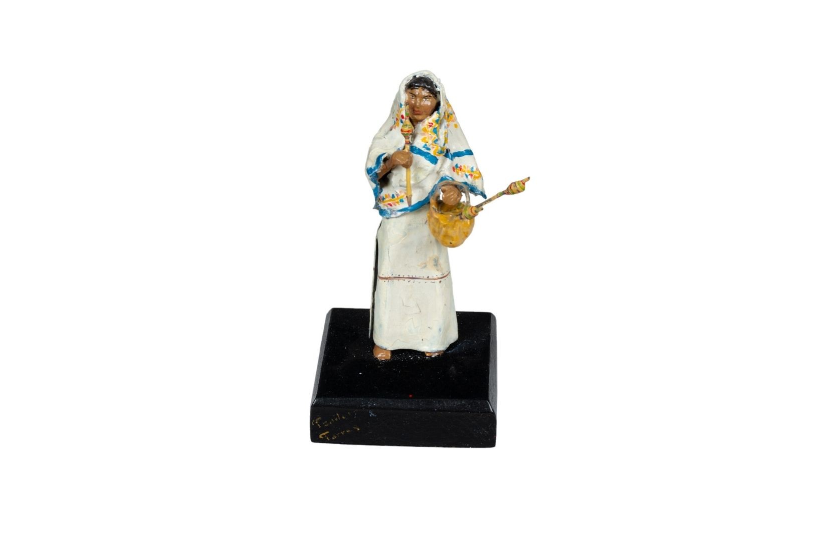 Mujer nahua de Los Reyes, Veracruz. Figura de plomo policromado. Artesano Teodoro Torres Orea, de Puebla. Col. Part. (Foto: EKV).