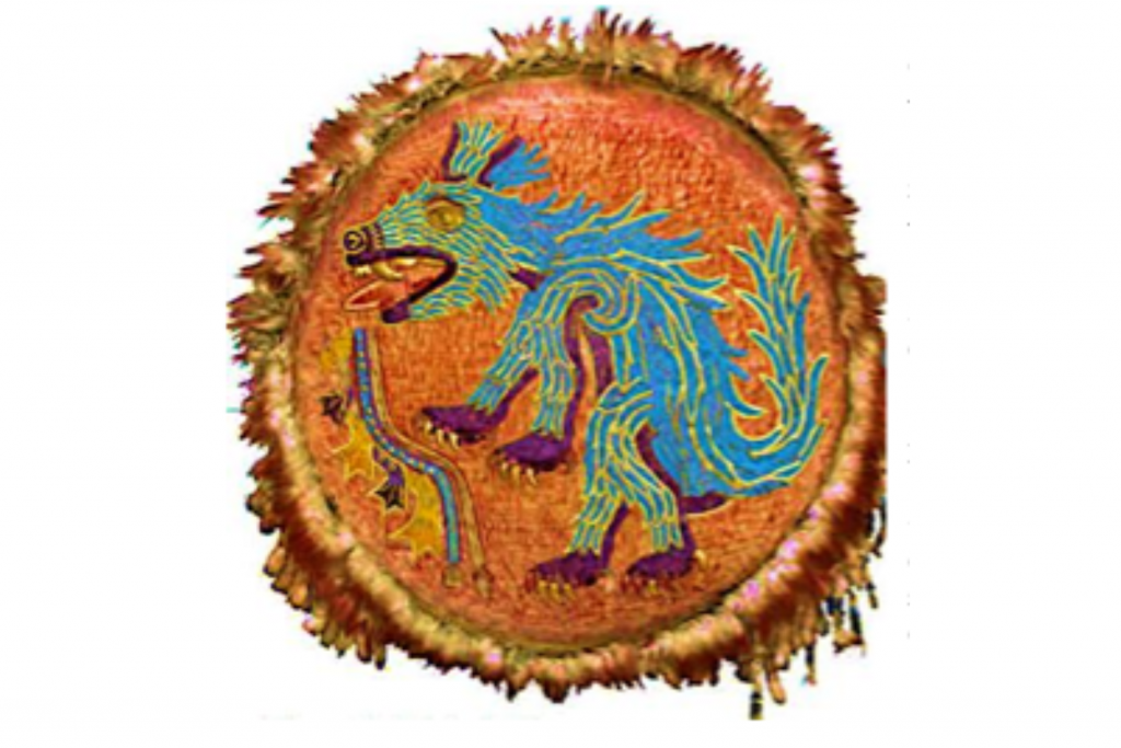 2- Escudo conocido como «de Ahuitzotl». Plumas (guacamayo rojo, cotinga azul, oropéndola amarilla, espátula rosada) y oro sobre un soporte de corteza de agave sostenido por una montura de madera y ratán. Azteca, principios del siglo XVI. Procedencia: castillo de Ambras, Tirol. Museum für Völkerkunde, Viena. Ahuitzotl fue tlatoani (soberano) de los aztecas desde 1486 hasta 1502, fecha en la que le sucedió su sobrino Moctezuma; su glifo era un mamífero asociado a una corriente de agua. Este escudo ceremonial es uno de los testimonios más raros del arte plumario prehispánico que nos ha llegado.